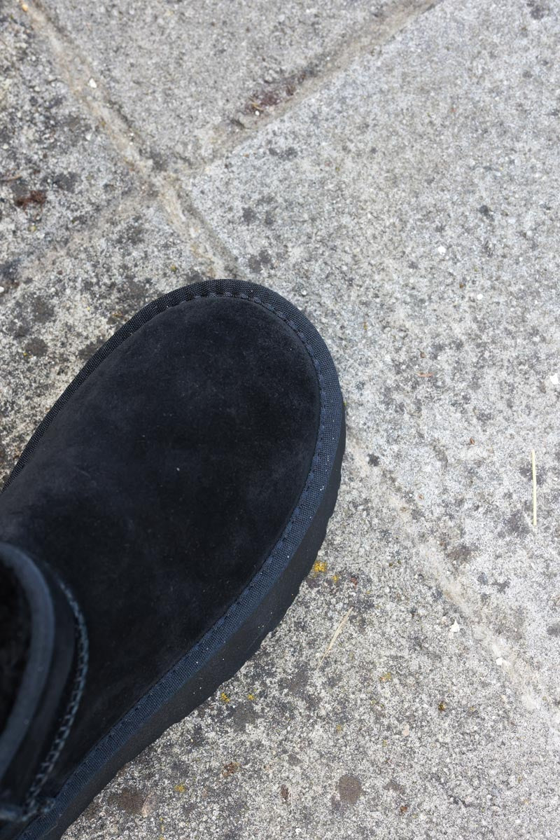 Bottes noires basses en cuir fourrées à plateforme — 9