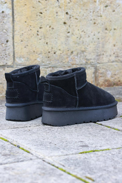 Bottes noires basses en cuir fourrées à plateforme — 6