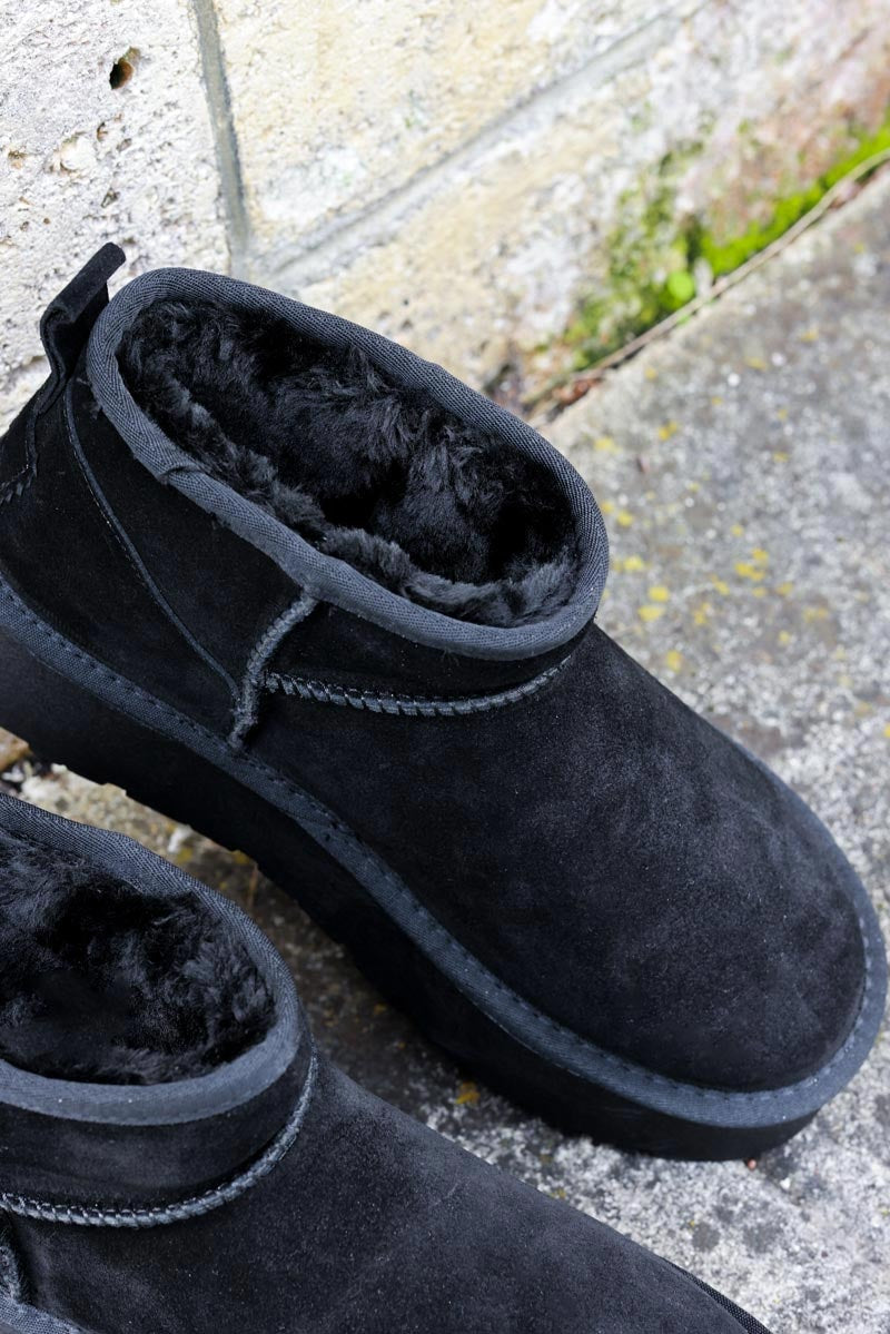 Bottes noires basses en cuir fourrées à plateforme — 2